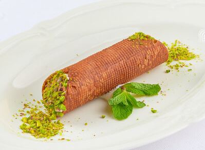 Cannolo Siciliano с рикоттой и фисташками в ресторане Mio